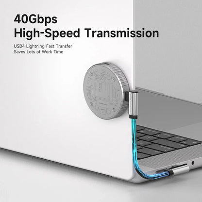 USB4 connector attached to a laptop with text highlighting high-speed transmission capabilities.
