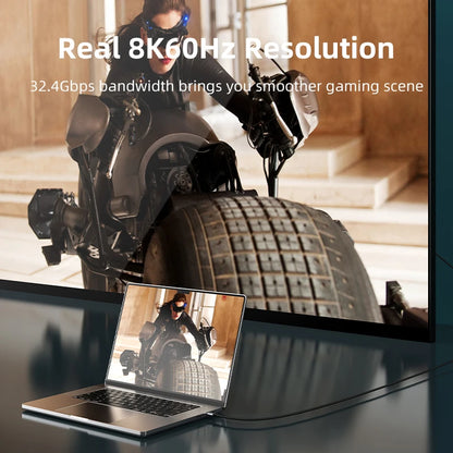 Gamer on a motorcycle with a large screen displaying high-resolution gaming scene.