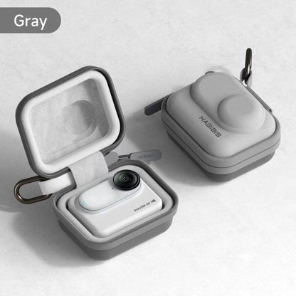 Gray wireless earbuds in a case on a light gray background