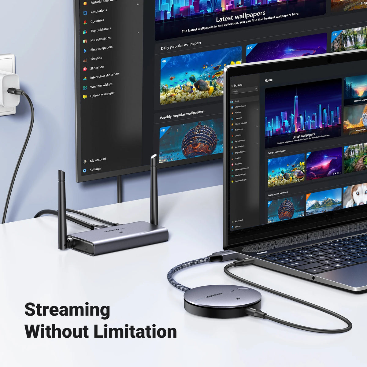 Laptop connected to a screen via a streaming device with multiple screens displaying different wallpapers.