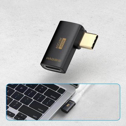 Hagibis HDMI adapter on a light gray background with a laptop inset showing connection.