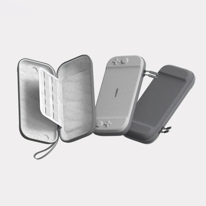 Gray travel case with a phone inside on a light gray background